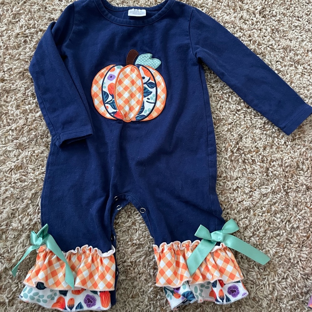 Little girl pumpkin romper
